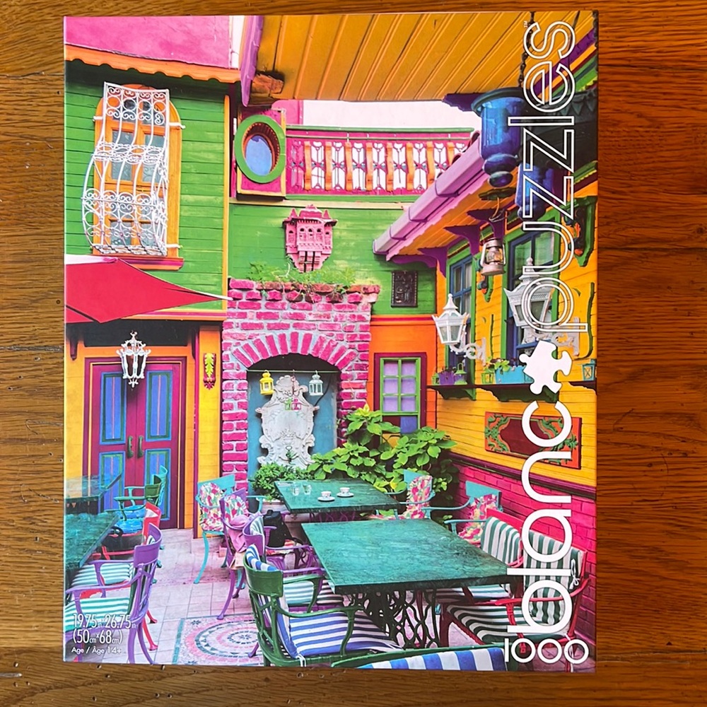 Blanc Buffalo Games 1,000 piece puzzle Bright Cafe Scene